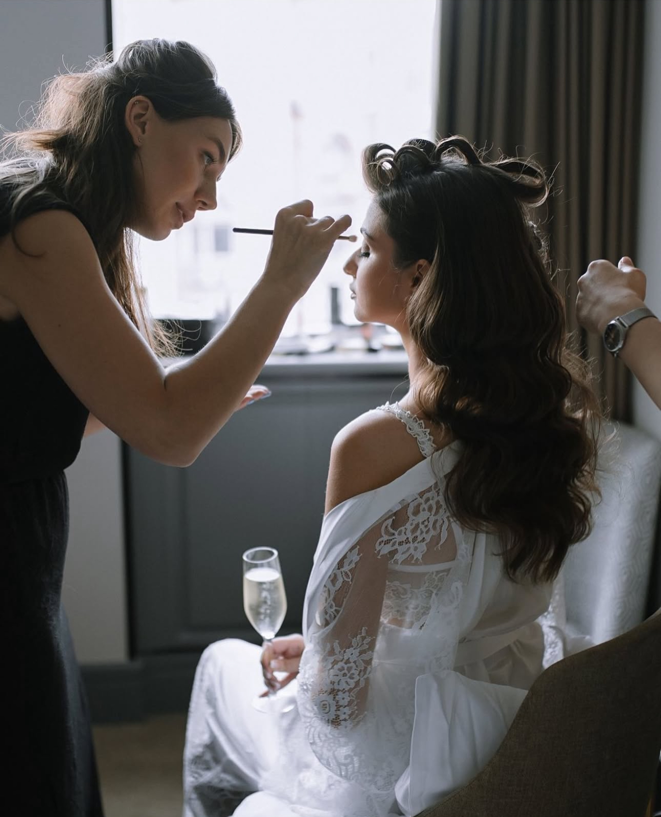 Makeup artist doing bridal makeup